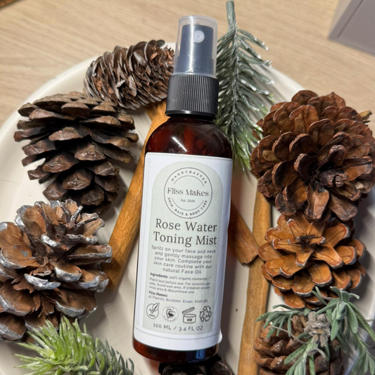 Bottle of 100% natural Fliss Makes Rose Water Toning Mist made with organic, vegan and cruelty-free ingredients, showcasing their nature-loving ingredients.