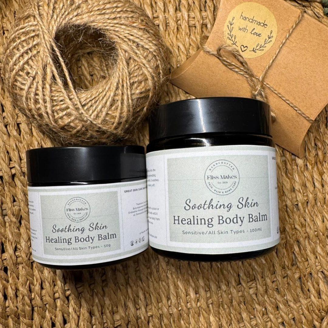 Two jars of 100% natural handcrafted Soothing Skin Healing Body Balm for eczema, psoriasis and dry skin made with organic, vegan and cruelty-free ingredients, showcasing its smooth texture.