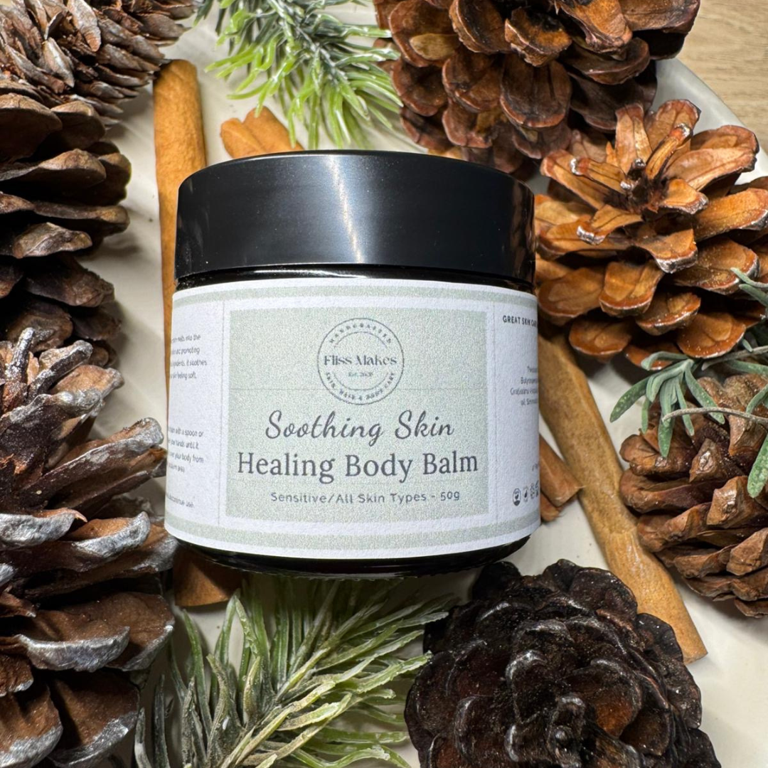 A jar of 100% natural handcrafted Soothing Skin Healing Body Balm for eczema, psoriasis and dry skin made with organic, vegan and cruelty-free ingredients, showcasing its smooth texture.