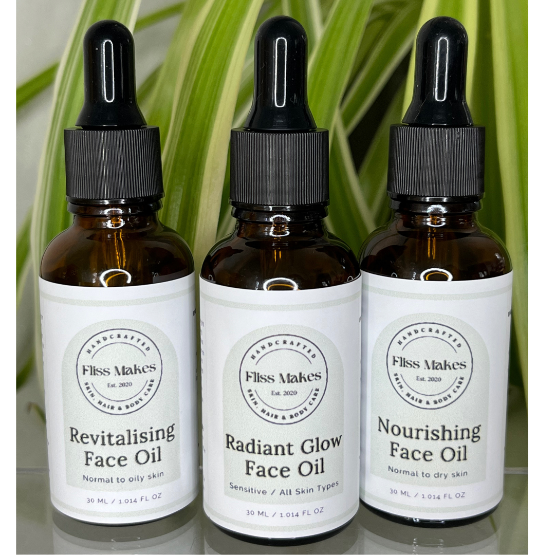 Bottles of 100% natural Fliss Makes Face Oil made with organic, vegan and cruelty-free ingredients, showcasing their nature-loving ingredients..