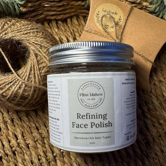 Jar of 100% natural refining face polish made with organic, vegan ingredients, showcasing its smooth texture.