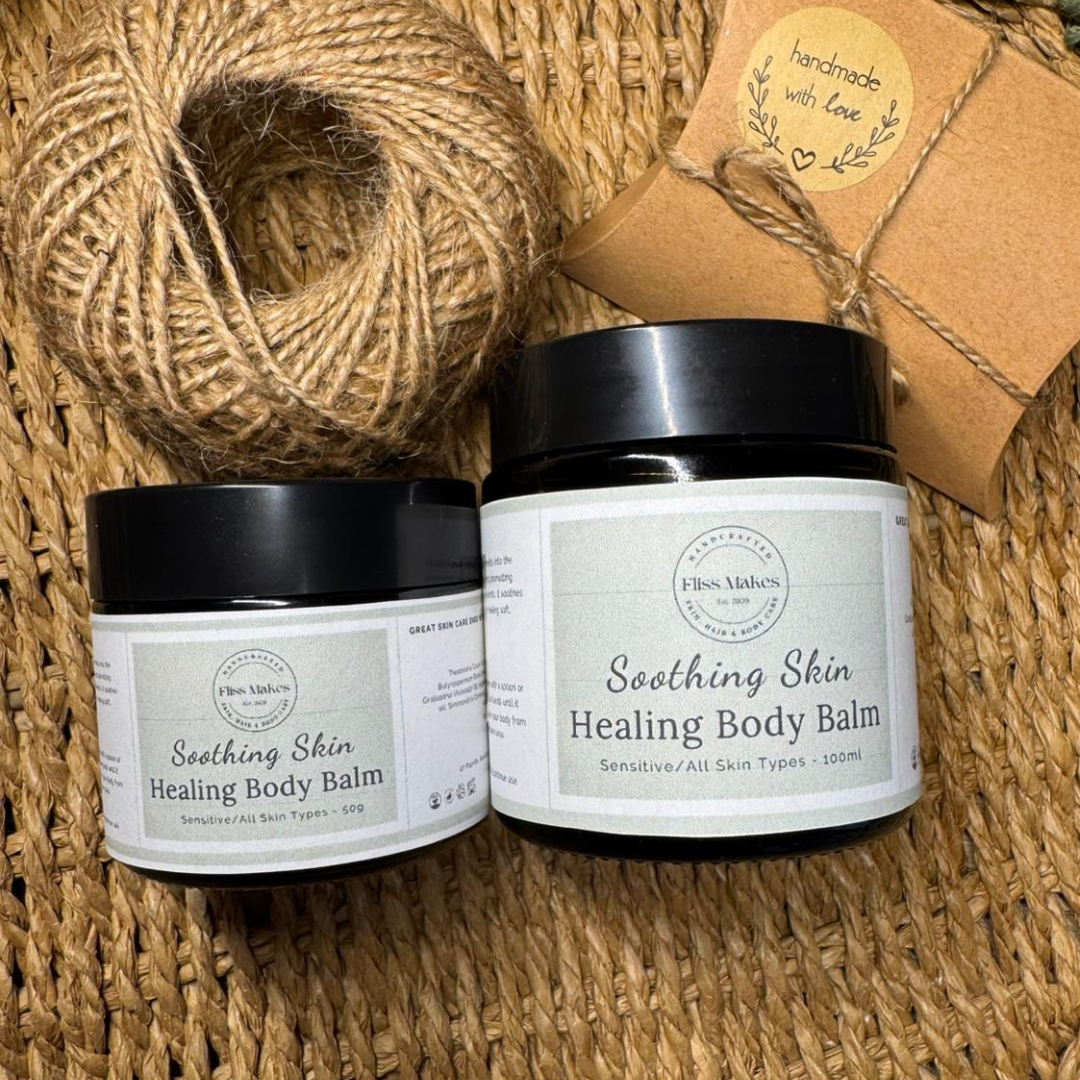 Jars of 100% natural Soothing Skin Healing Body Balm by Fliss Makes made with organic, vegan and cruelty-free ingredients, showcasing their nature-loving ingredients.