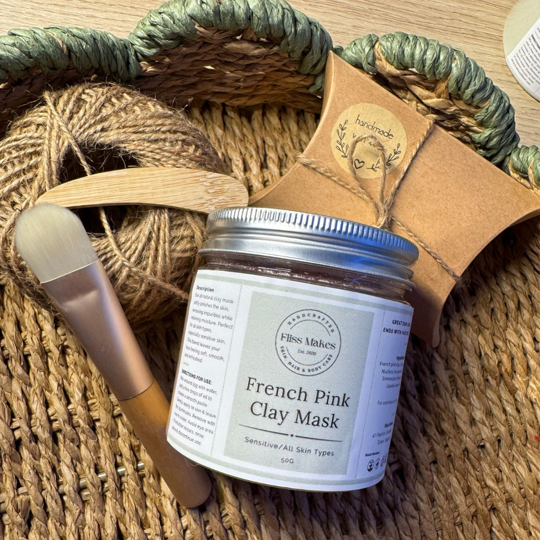 A jar of 100% natural handcrafted French pink clay mask for sensitive skin made with organic, vegan and cruelty-free ingredients, showcasing its smooth texture.